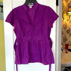 Purple blouse that ties in the back size medium from Charlotte Russe